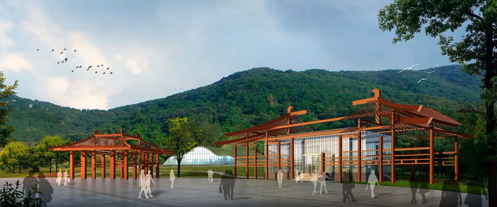 Architectural rendering of red pavilion structures and a glass building against green mountains